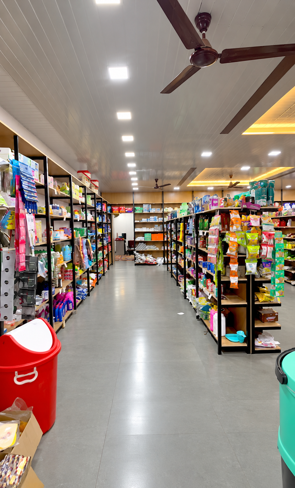 Interior view of spacious shopping aisles at Laxmi Supermart, Pushkar